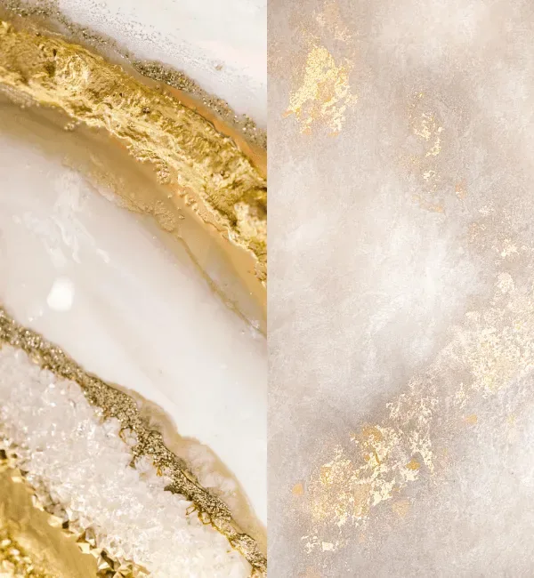 Abstract gold and white marbled texture with glittering crystal formations.